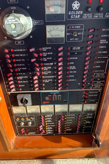 Paradosi Yacht Photos Pics Control panel of a 1990 Nova 4500 boat with various switches and indicators.