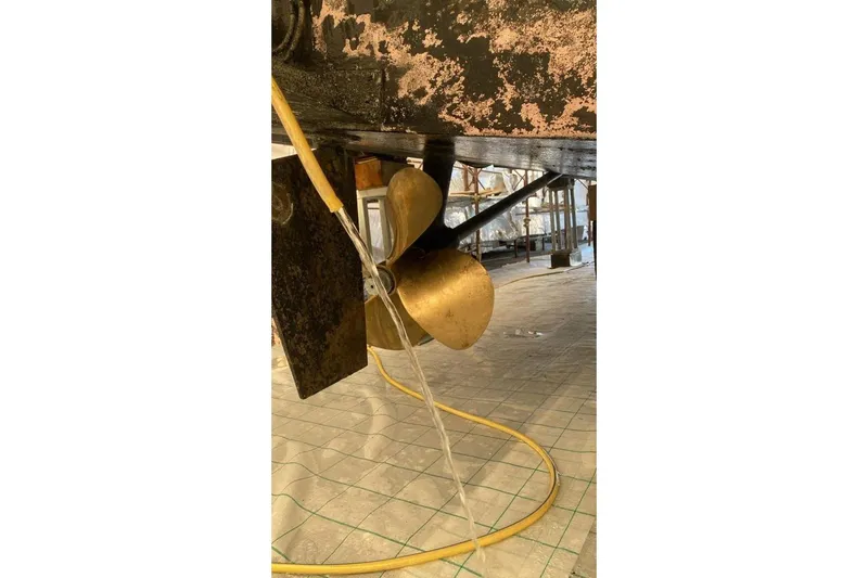  Yacht Photos Pics Propeller of 2007 Apreamare 48 yacht in maintenance setting.