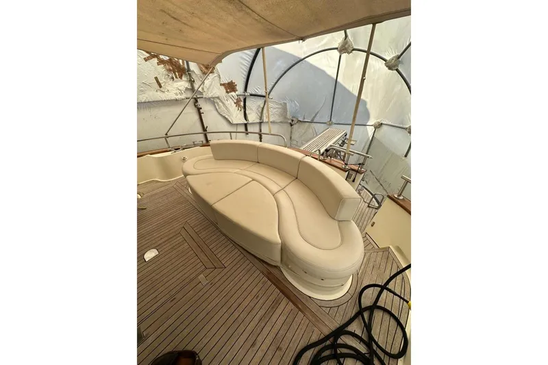  Yacht Photos Pics Luxurious seating on 2007 Apreamare 48 yacht with elegant wooden deck.