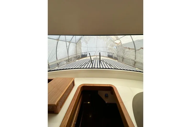  Yacht Photos Pics Interior view of 2007 Apreamare 48 yacht with striped deck cover.