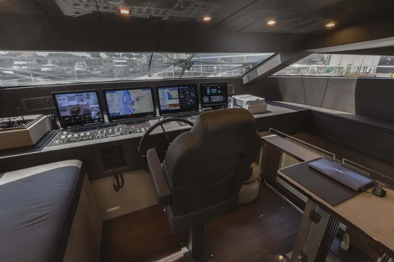 Ship Happens Yacht Photos Pics Luxurious 2024 Maiora 30 Walkaround yacht cockpit with advanced navigation systems.