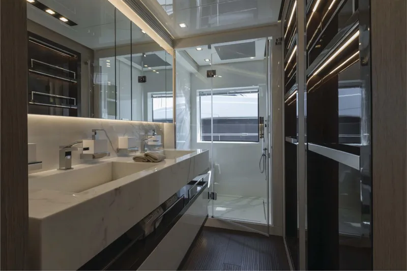 Ship Happens Yacht Photos Pics Luxurious bathroom interior of 2024 Maiora 30 Walkaround yacht, featuring modern fixtures and elegant design.