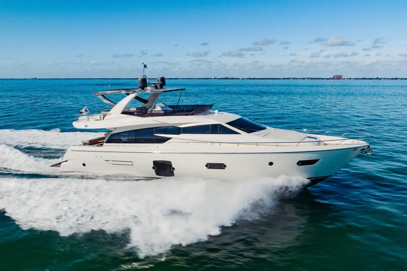 Sami Kay III Yacht Photos Pics 2017 Ferretti Yachts 750 cruising on open water under a clear blue sky.