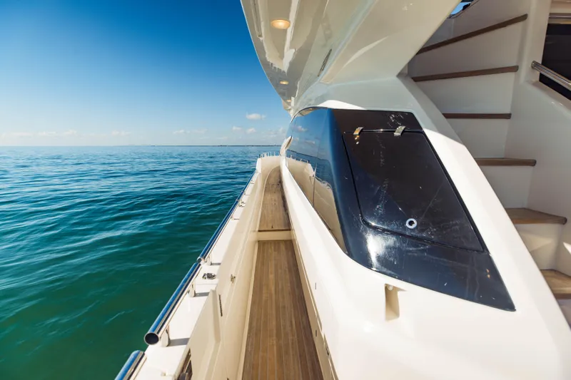 Sami Kay III Yacht Photos Pics 2017 Ferretti Yachts 750 side deck with ocean view and clear blue sky.
