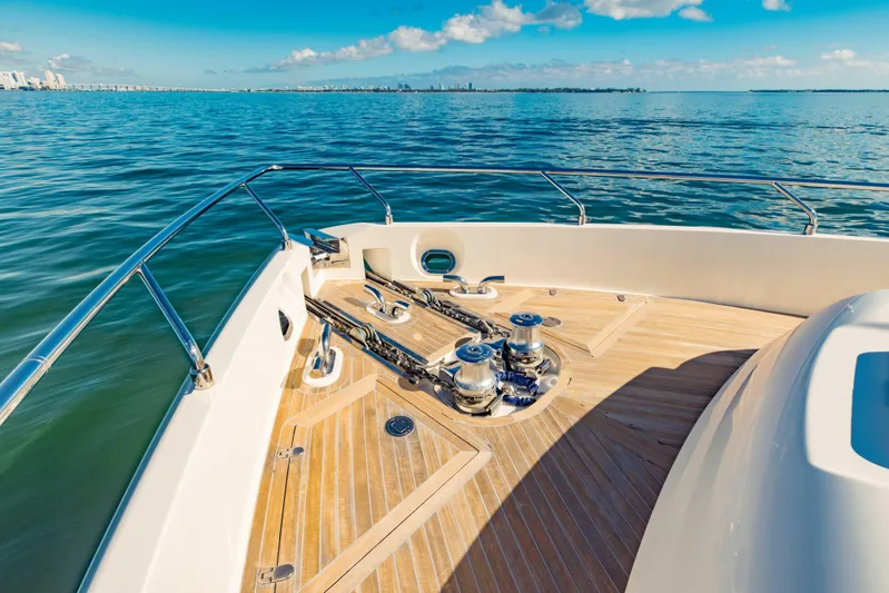 Sami Kay III Yacht Photos Pics Bow of 2017 Ferretti Yachts 750 on calm sea under blue sky.