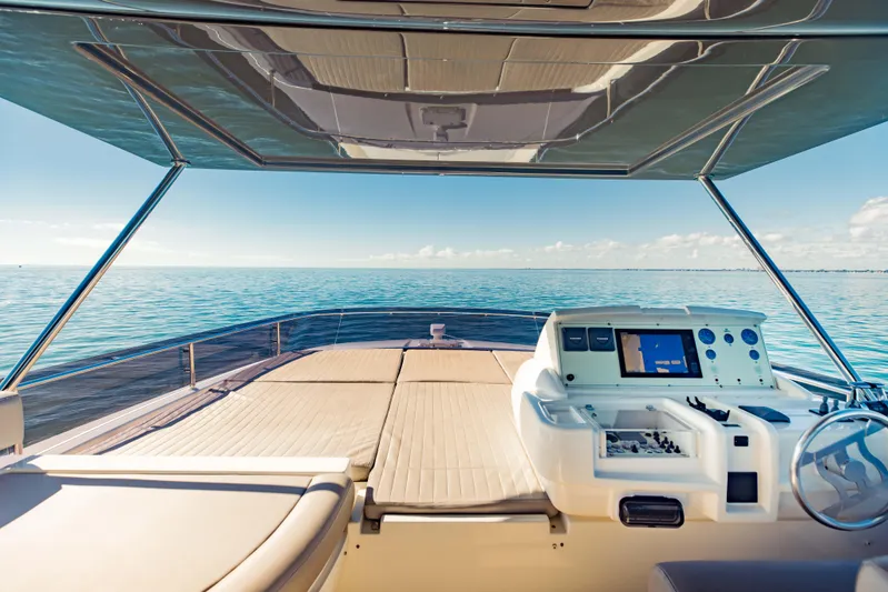 Sami Kay III Yacht Photos Pics Luxurious 2017 Ferretti Yachts 750 helm with ocean view and modern controls.