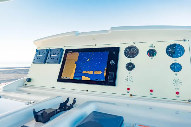 Sami Kay III Yacht Photos Pics Cockpit of 2017 Ferretti Yachts 750 with navigation display and gauges.