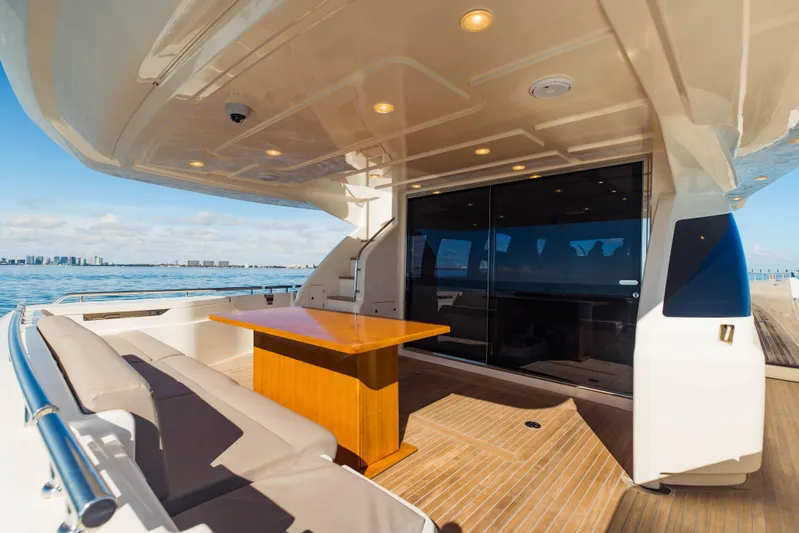 Sami Kay III Yacht Photos Pics Luxurious 2017 Ferretti Yachts 750 deck with seating and ocean view.
