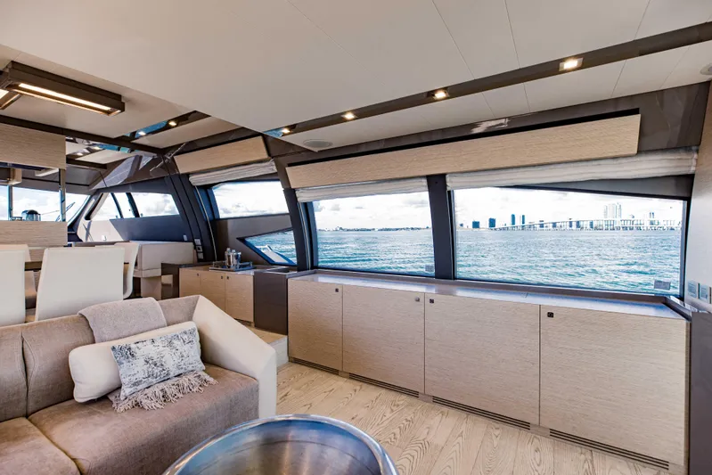 Sami Kay III Yacht Photos Pics Luxurious interior of 2017 Ferretti Yachts 750 with ocean view through large windows.