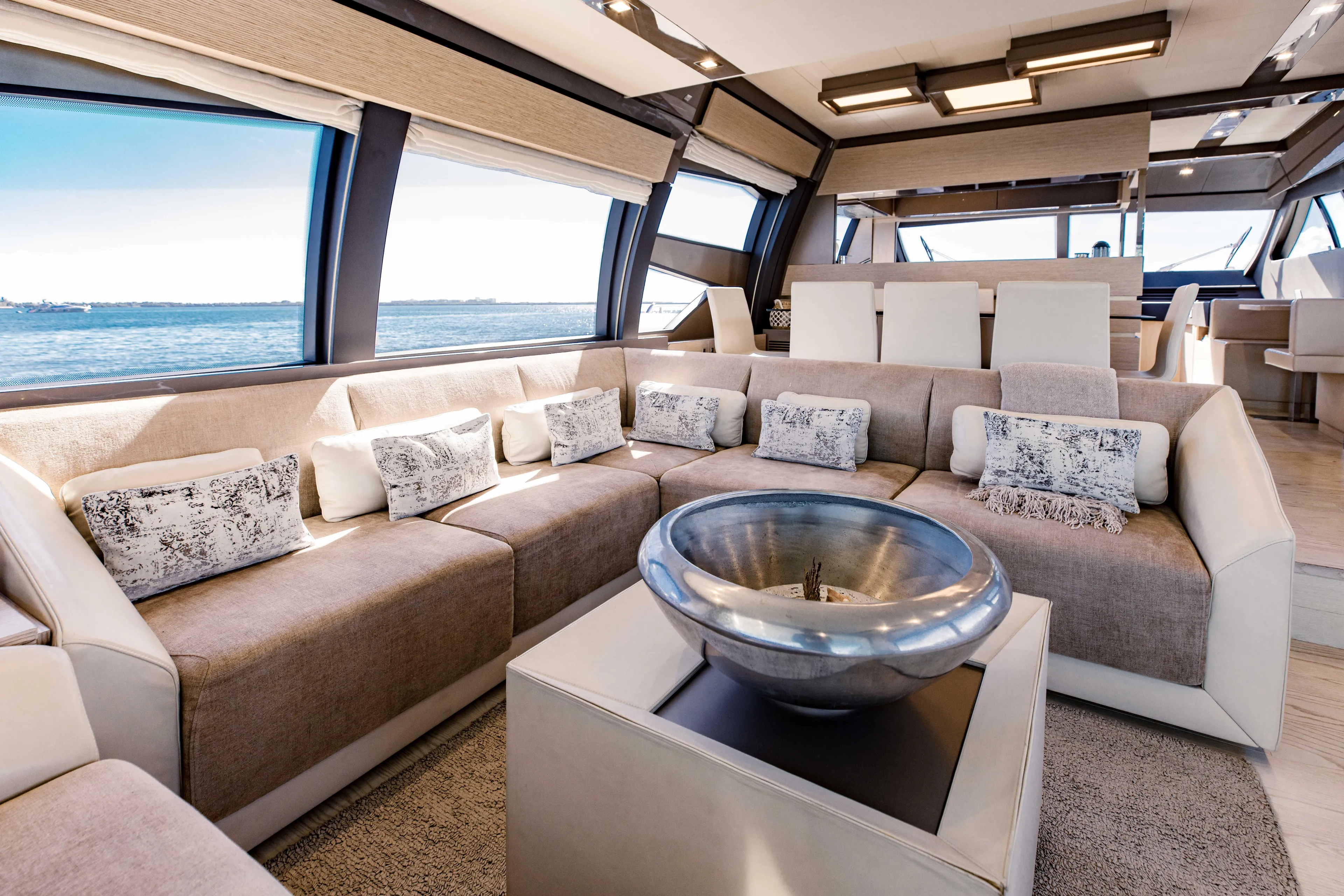 Sami Kay III Yacht Photos Pics Luxurious interior of 2017 Ferretti Yachts 750 with elegant seating and ocean view.