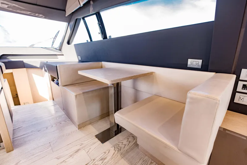 Sami Kay III Yacht Photos Pics Luxurious interior of 2017 Ferretti Yachts 750 with elegant seating and modern design.