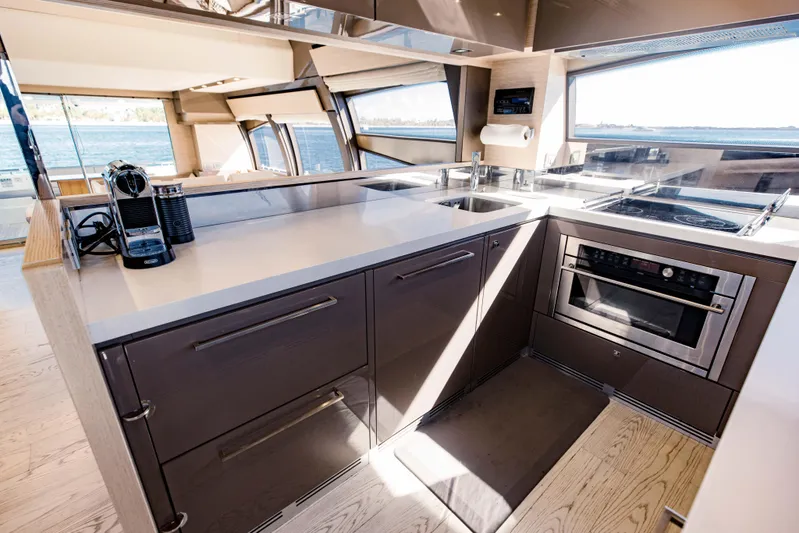 Sami Kay III Yacht Photos Pics Luxurious kitchen interior of 2017 Ferretti Yachts 750 with modern appliances and sleek design.