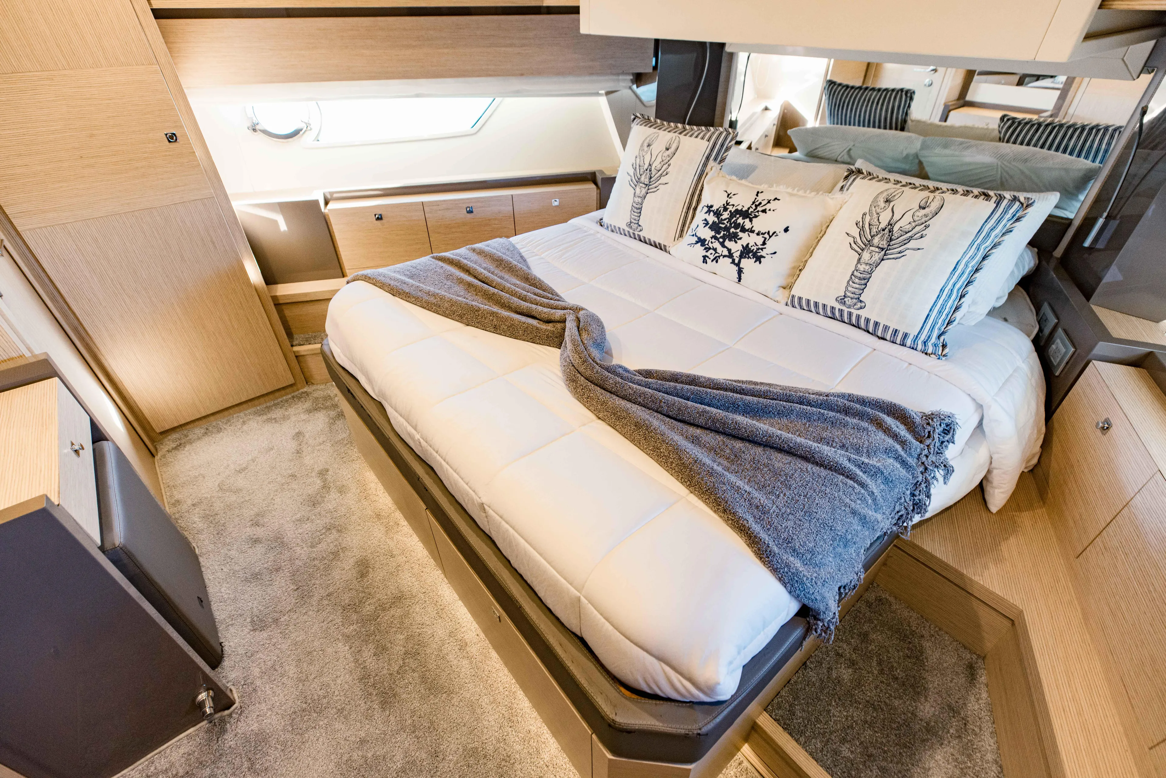 Sami Kay III Yacht Photos Pics Luxurious bedroom interior of 2017 Ferretti Yachts 750 with elegant bedding and modern design.