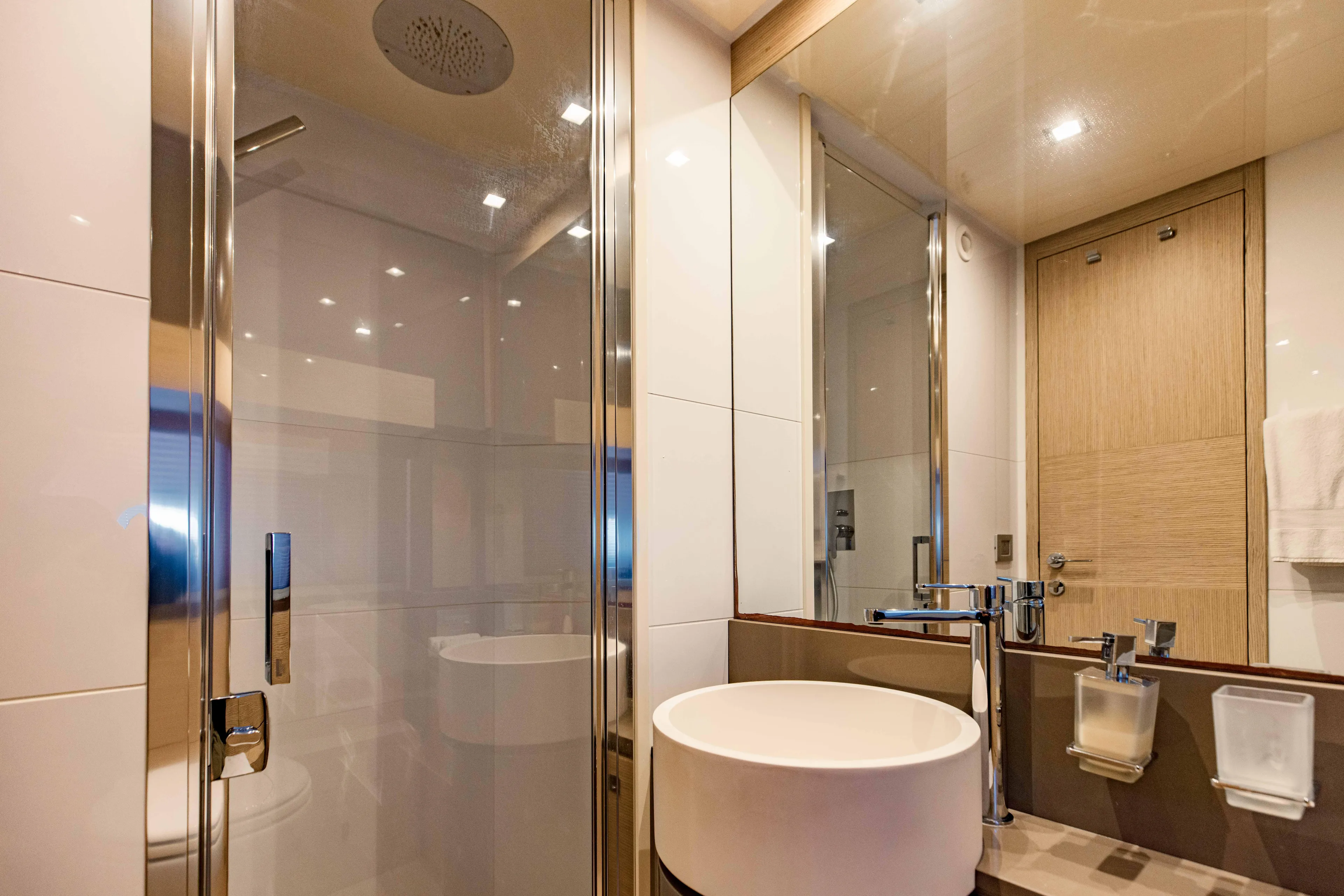 Sami Kay III Yacht Photos Pics Luxurious bathroom in 2017 Ferretti Yachts 750, featuring modern fixtures and elegant design.