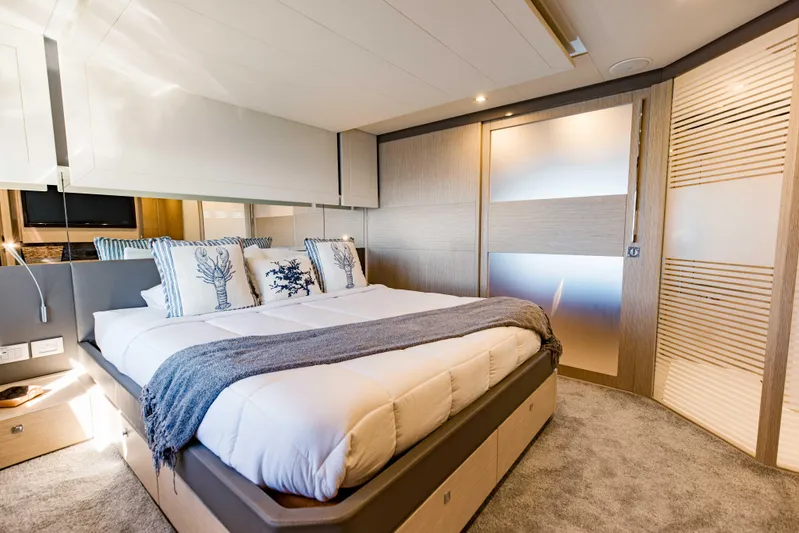 Sami Kay III Yacht Photos Pics Luxurious bedroom interior of 2017 Ferretti Yachts 750 with modern design and elegant decor.