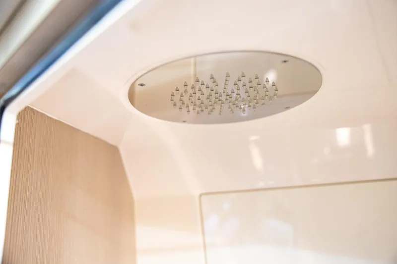  Yacht Photos Pics 2024 Scout 377 LXF boat showerhead, modern design, interior view.