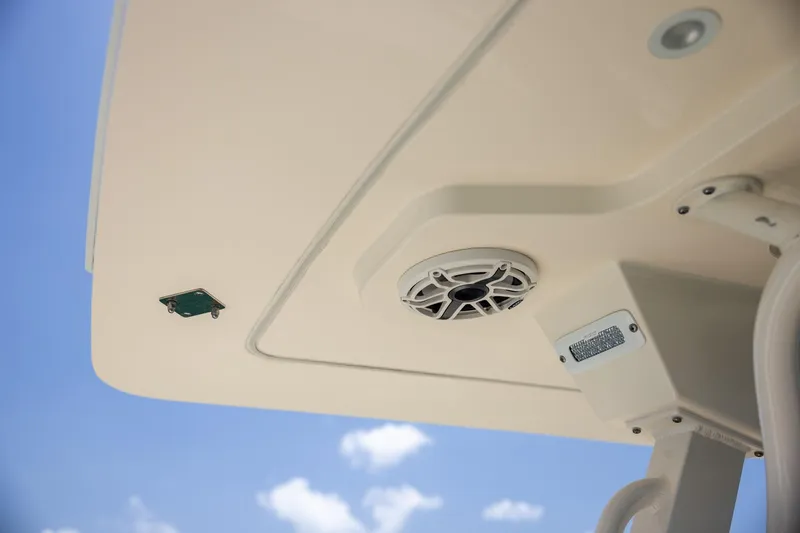  Yacht Photos Pics 2024 Scout 377 LXF boat ceiling with speaker and light against blue sky.