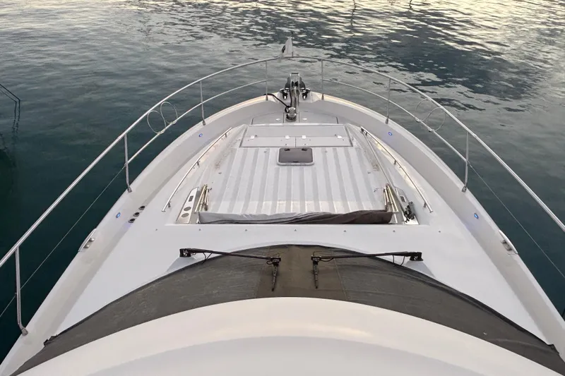  Yacht Photos Pics 2018 Prestige 560 yacht bow view on calm water.