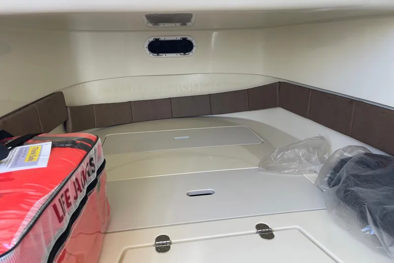  Yacht Photos Pics Interior cabin of 2020 Chris-Craft Catalina 30 with life jackets and storage.