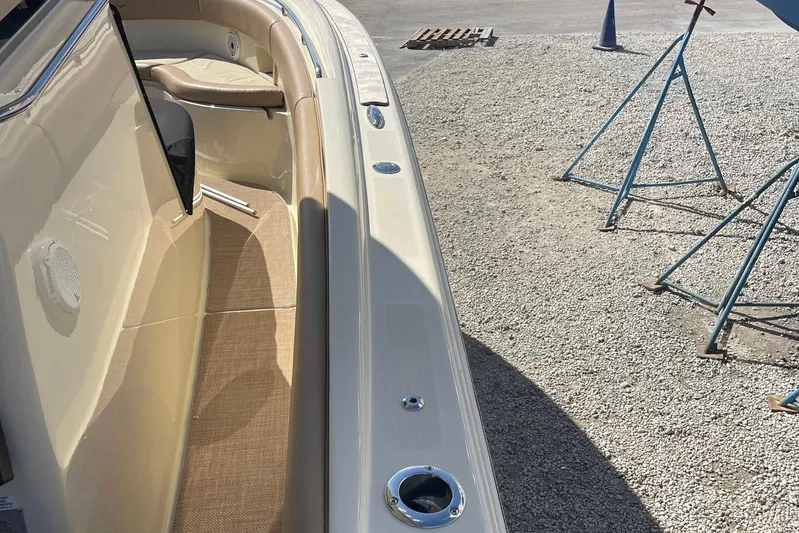  Yacht Photos Pics 2020 Chris-Craft Catalina 30 boat interior with beige seating and deck details.