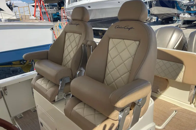  Yacht Photos Pics Luxurious seating on 2020 Chris-Craft Catalina 30 boat, featuring elegant diamond-stitched upholstery.