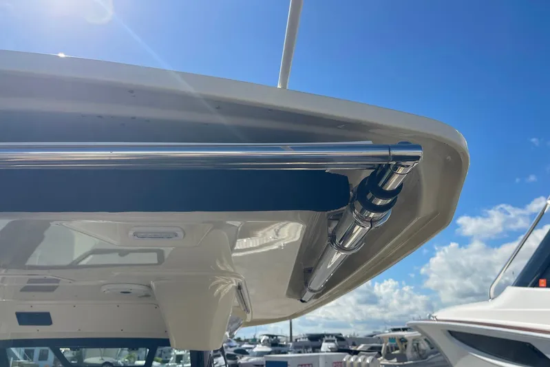  Yacht Photos Pics 2020 Chris-Craft Catalina 30 boat detail with stainless steel fittings under a clear blue sky.
