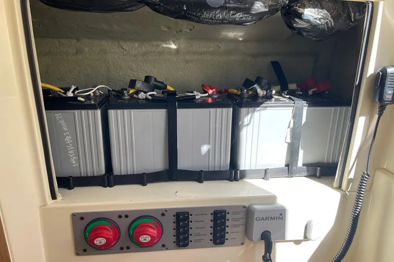  Yacht Photos Pics Battery compartment of 2020 Chris-Craft Catalina 30 with control panel and Garmin device.