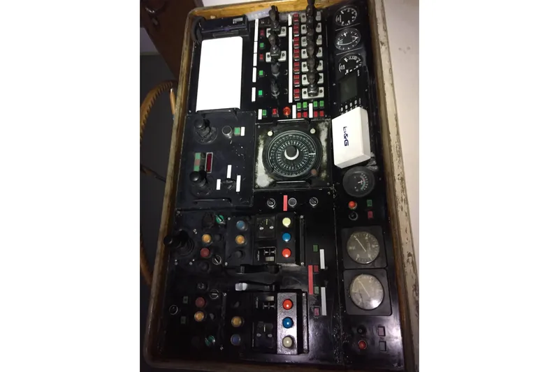  Yacht Photos Pics Control panel of 2001 Ortona Navi 115 yacht with gauges and switches.