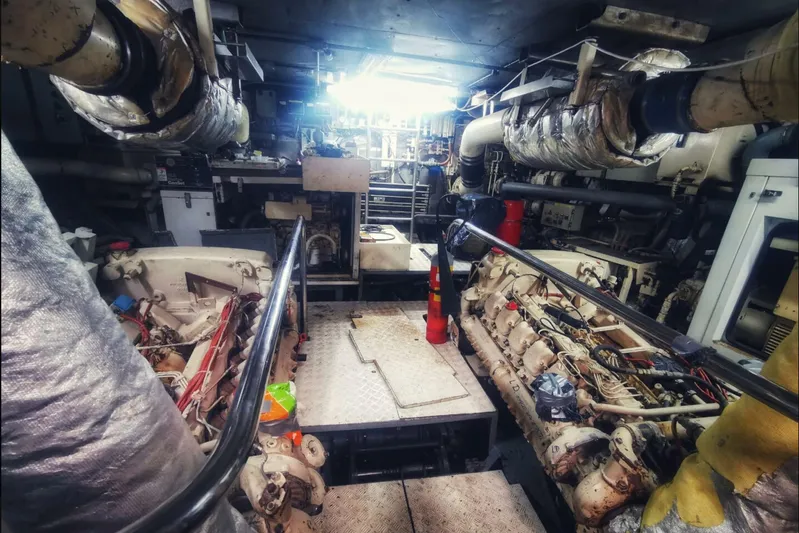  Yacht Photos Pics Engine room of 2001 Ortona Navi 115 yacht, showcasing machinery and equipment.