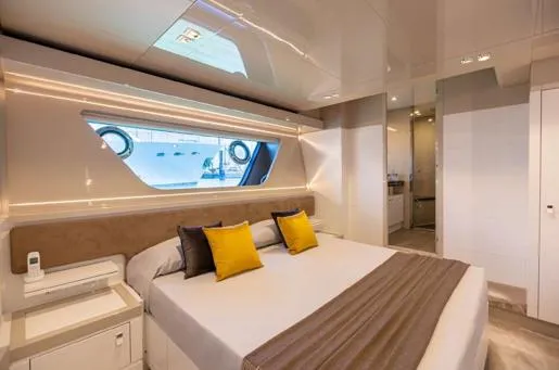  Yacht Photos Pics Luxurious bedroom interior of 2016 Custom Line Navetta 28 yacht with modern design and large window.