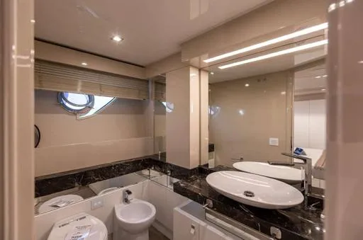  Yacht Photos Pics Luxurious bathroom interior on 2016 Custom Line Navetta 28 yacht, featuring modern fixtures and elegant design.