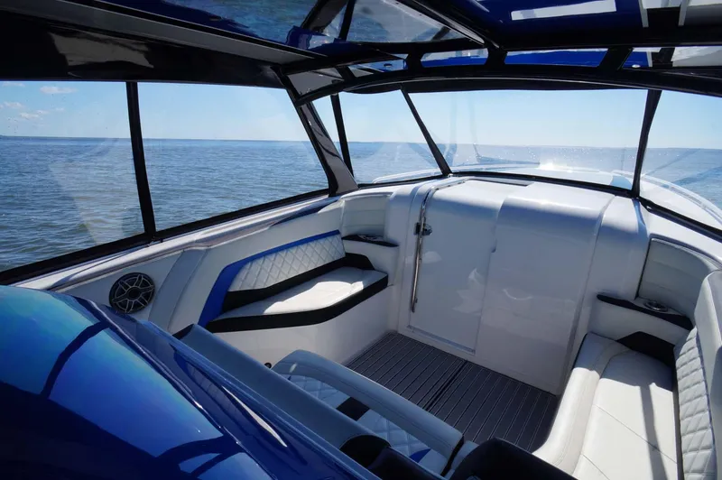 Blueprint Yacht Photos Pics Luxurious 2020 Concept 44' Cuddy Cabin boat interior with ocean view.