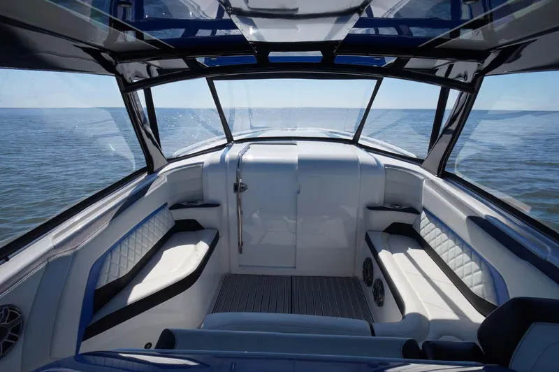 Blueprint Yacht Photos Pics Luxurious 2020 Concept 44' Cuddy Cabin boat interior with ocean view.