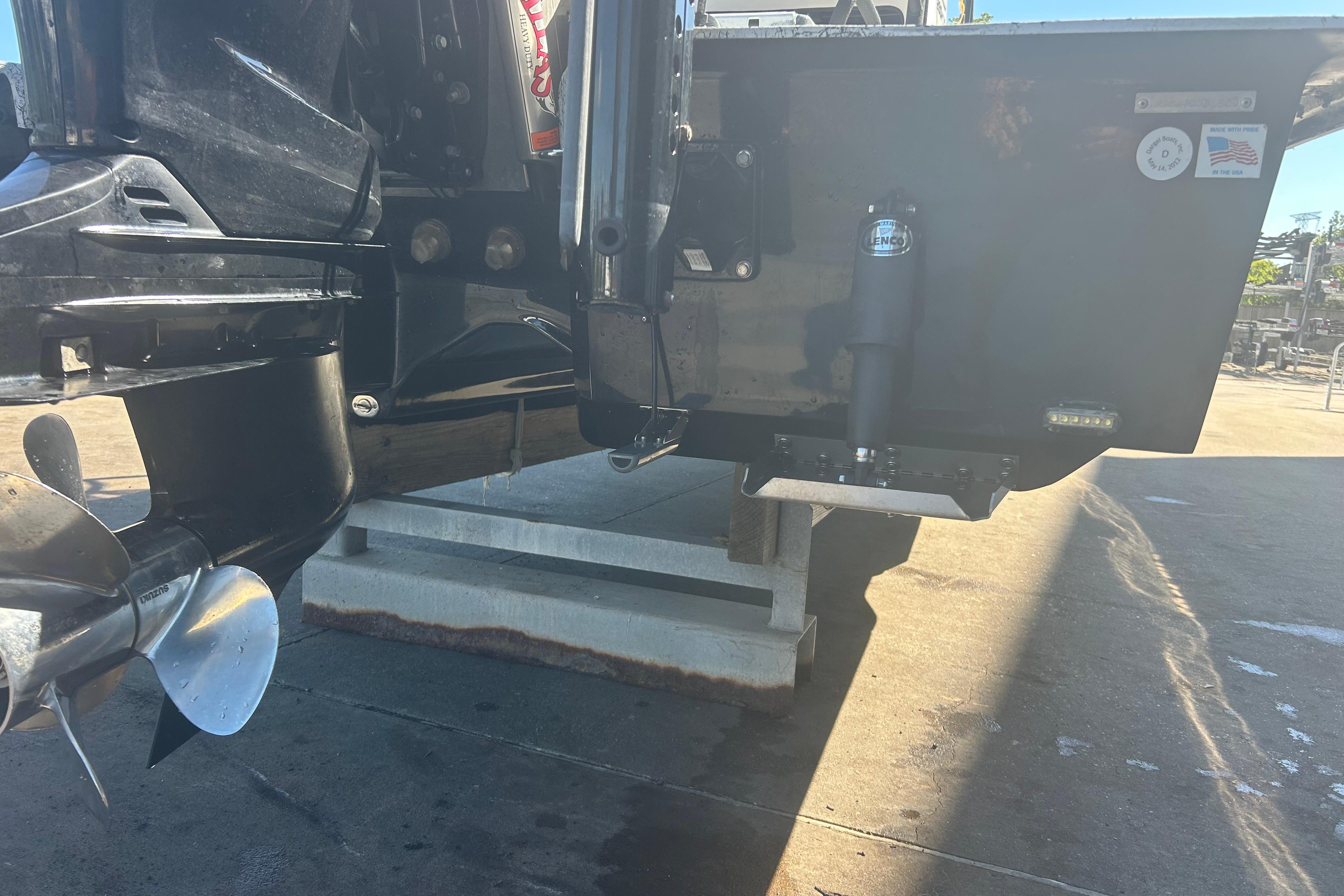 2020 Dargel Kat 250 HDX boat's rear view with propeller and hydraulic components.