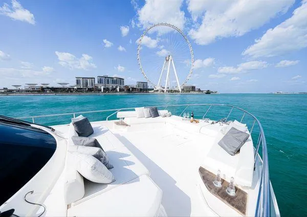  Yacht Photos Pics Luxurious 2019 Ferretti Yachts 670 with scenic ocean view and city skyline.