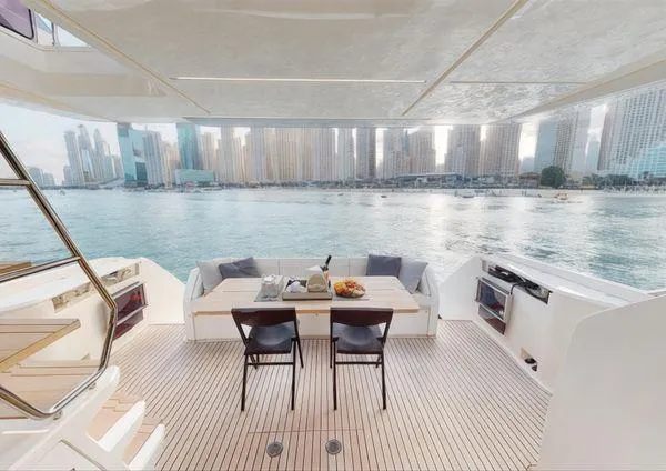  Yacht Photos Pics Luxurious 2019 Ferretti Yachts 670 with elegant deck and stunning waterfront city view.