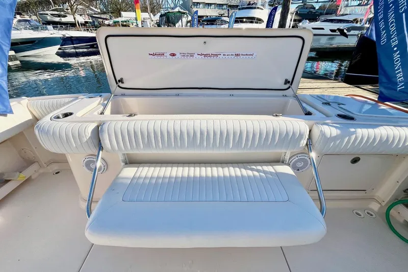  Yacht Photos Pics 2005 Grady-White Express 360 boat interior with open storage compartment at marina.