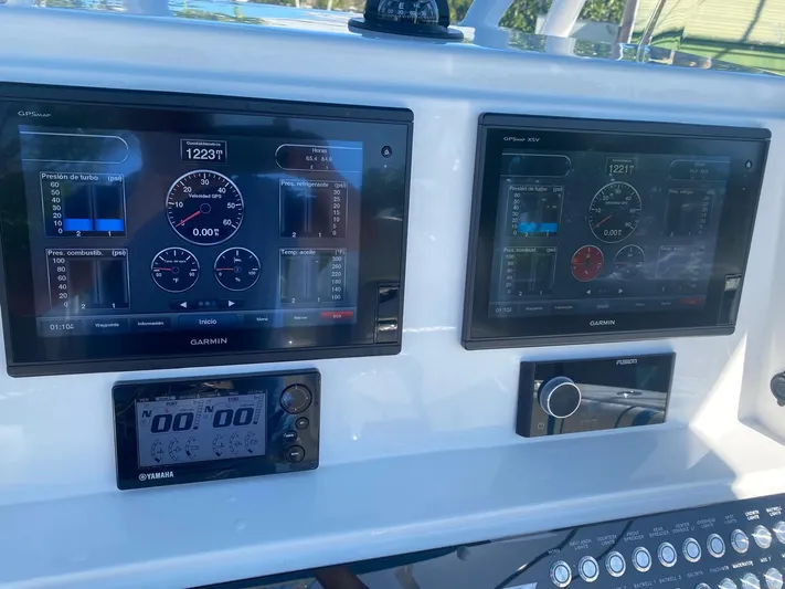  Yacht Photos Pics Control panel of a 2019 Sea Tech 33 boat with Garmin displays.