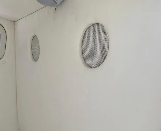  Yacht Photos Pics Interior of a 2019 Sea Tech 33 boat with circular ventilation grilles.