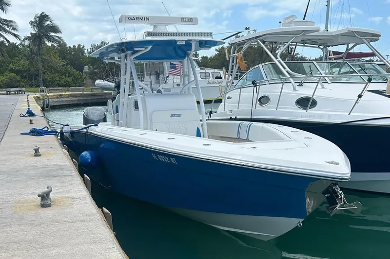  Yacht Photos Pics Blue 2019 Sea Tech 33 boat docked at marina with Garmin equipment.