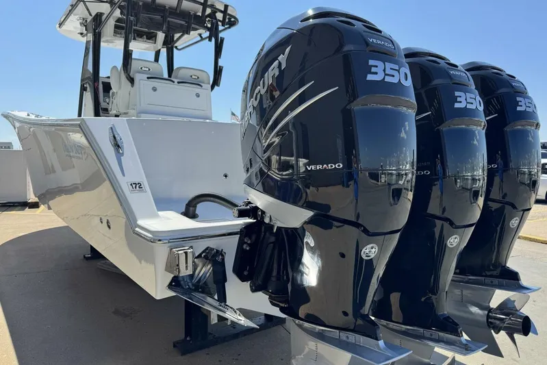  Yacht Photos Pics 2022 Onslow Bay 33 TE boat with triple Mercury 350 Verado engines, docked outdoors.
