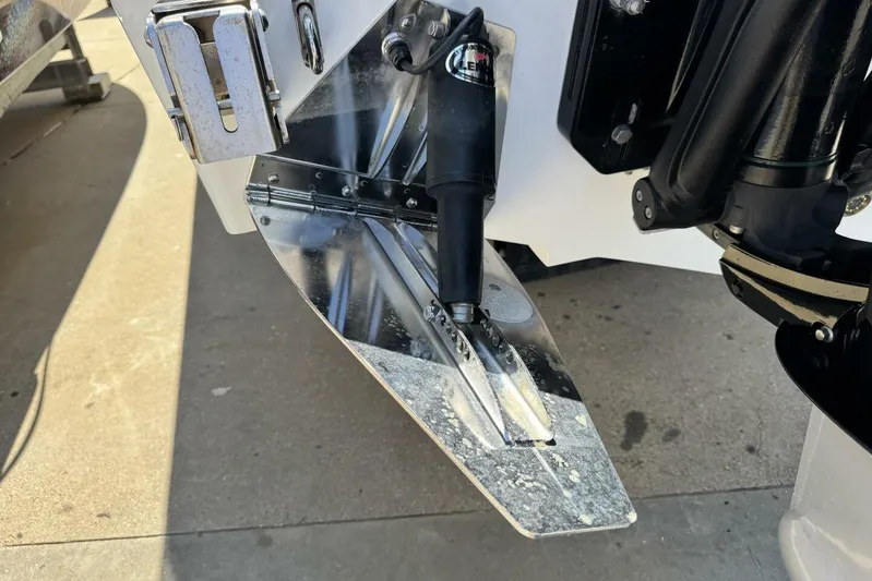  Yacht Photos Pics Trim tab of a 2022 Onslow Bay 33 TE boat, close-up view.