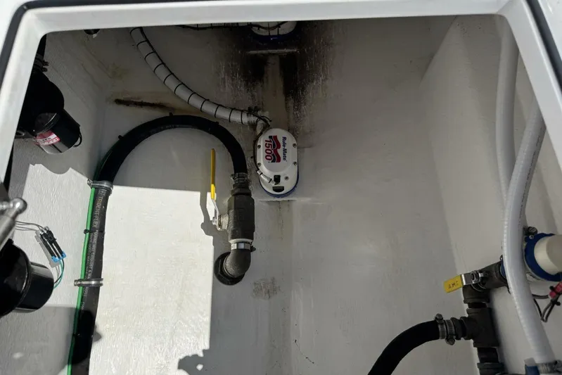  Yacht Photos Pics Bilge area of 2022 Onslow Bay 33 TE boat with pump and hoses.