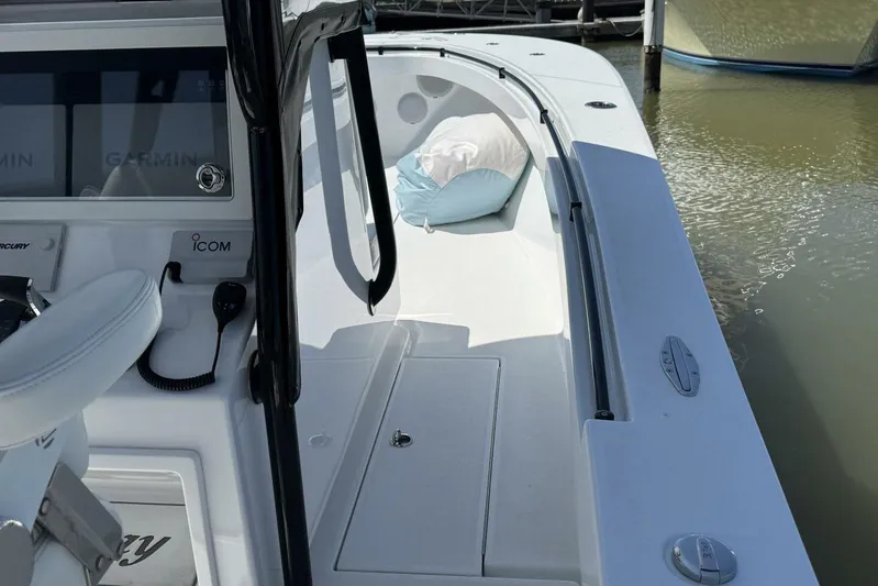  Yacht Photos Pics 2022 Onslow Bay 33 TE boat interior with Garmin displays and comfortable seating.