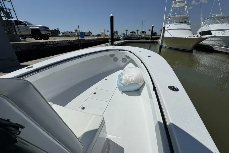  Yacht Photos Pics 2022 Onslow Bay 33 TE boat docked at marina, featuring spacious deck and sleek design.