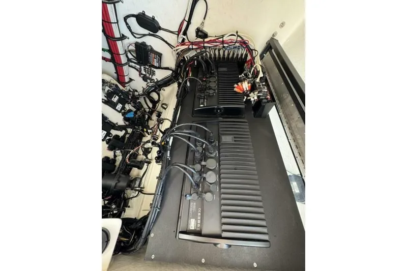  Yacht Photos Pics Electrical system of a 2022 Onslow Bay 33 TE boat, showcasing wiring and components.