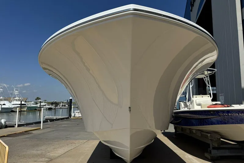  Yacht Photos Pics 2022 Onslow Bay 33 TE boat docked at a marina under clear blue skies.