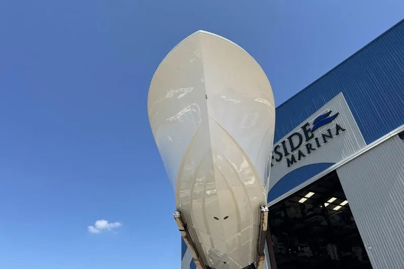  Yacht Photos Pics 2022 Onslow Bay 33 TE boat at dockside marina under clear blue sky.