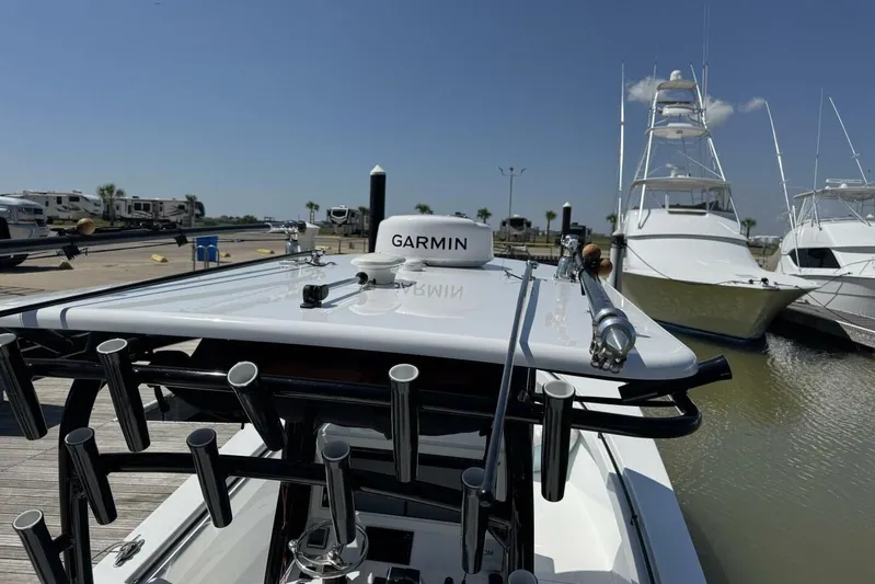  Yacht Photos Pics 2022 Onslow Bay 33 TE boat with Garmin equipment at marina dock.