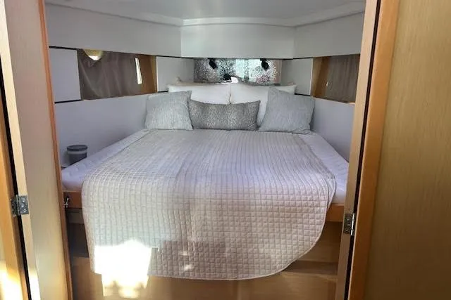 Hummingbird Yacht Photos Pics Luxurious cabin interior of 2017 Beneteau Oceanis 38.1 yacht with cozy bedding.